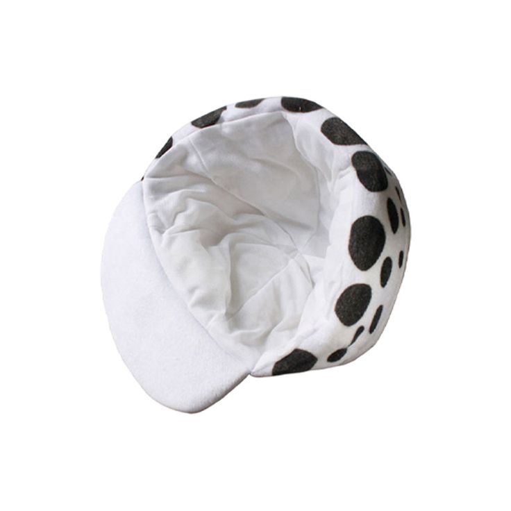 a white hat with black spots on it