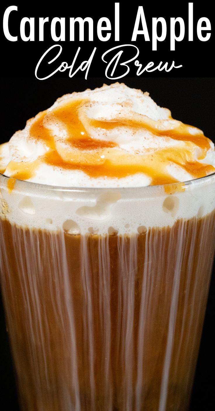 A pint glass filled with cold brew coffee topped with whipped cream and caramel sits on a black background. White text at the top reads "Caramel Apple Cold Brew". Cold Brew Flavor Recipes, Fall Flavor Coffee, Cold Brew Coffee Syrup Recipe, Cold Brew Flavors, Fall Cold Brew Coffee Recipes, Fall Apple Drinks, Caramel Apple Cold Brew, Caramel Apple Iced Coffee, Apple Pie Coffee Drinks