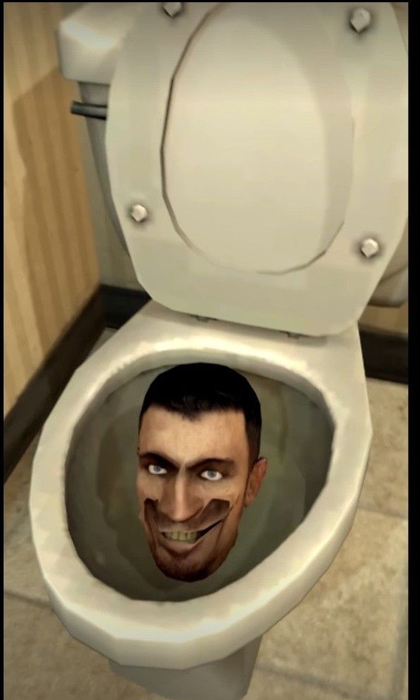 a man's face is reflected in the toilet bowl with his mouth wide open