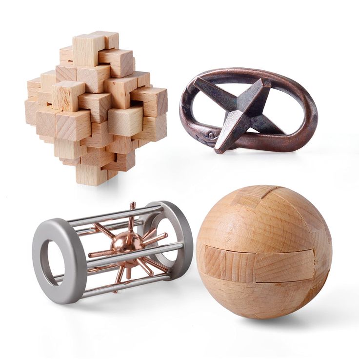 four different types of wooden toys including a ball, pinwheel and ring cutters