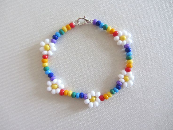 Rainbow Flower Daisy Chain Bracelet Pride Bracelet Multicolour Indie Boho Daisy Seed Bead Bracelet Unisex Bracelet Colorful Flower Bracelet  To find the exact wrist/ankle size, take a tape measure! This colorful bracelet is made of size 6/0 beads If you need an adjustable extension chain, email me. Daisy Chain Bracelet, Beaded Flower Bracelet, Colorful Bead Bracelet, Stackable Bead Bracelet, Summer Bracelet, Beaded Bracelet Rainbow Multicolour Indie Boho Daisy Seed Bead Choker Necklace Beaded Jewelry Rainbow, Rainbow Bead Bracelet Patterns, Pride Seed Bead Bracelets, Colorful Seed Bead Bracelets, Beaded Rainbow Bracelet, Rainbow Flower Necklace, Diy Rainbow Bracelet, Beaded Pride Bracelet, Rainbow Seed Bead Bracelet