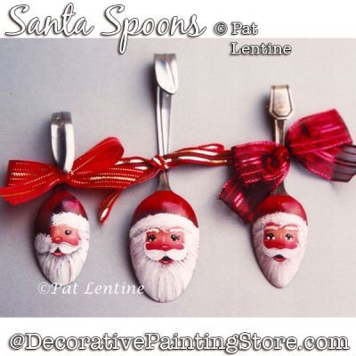 three santa spoons hanging from a red ribbon