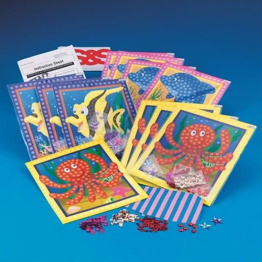 there are many cards with different designs on them, including an octopus and other animals