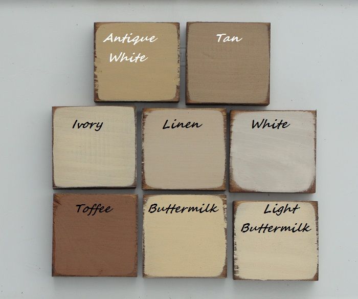 several different shades of paint on top of each other with the words antique white, ivory, light buttermik, and tan