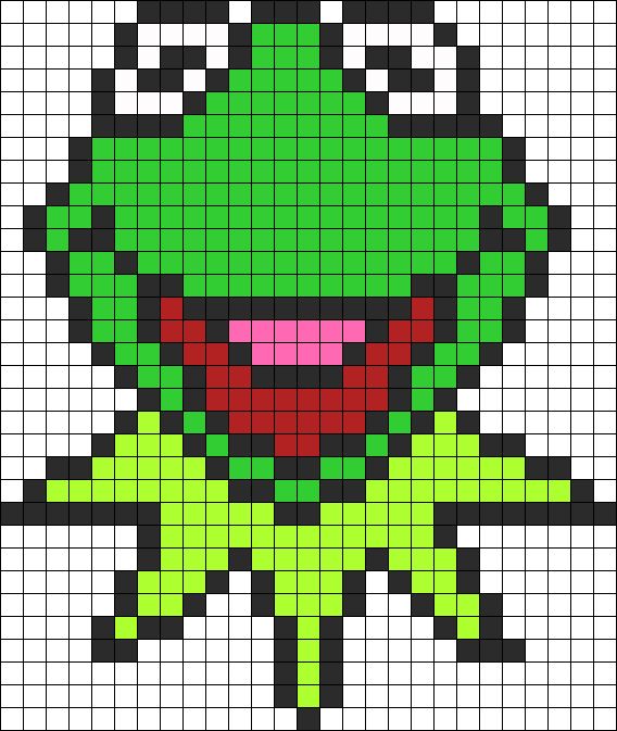 an image of a pixellated pattern with a green frog on it's face