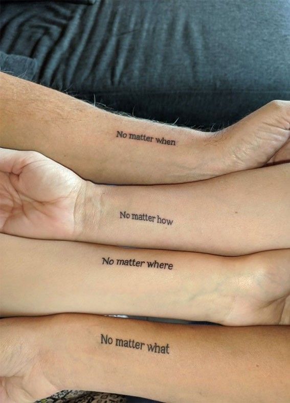 three people sitting on a couch with their arms crossed and one has two small tattoos that say no matter when