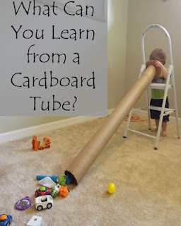 a child playing on a ladder with toys in the background and a sign that says, what can you learn from a cardboard tube?