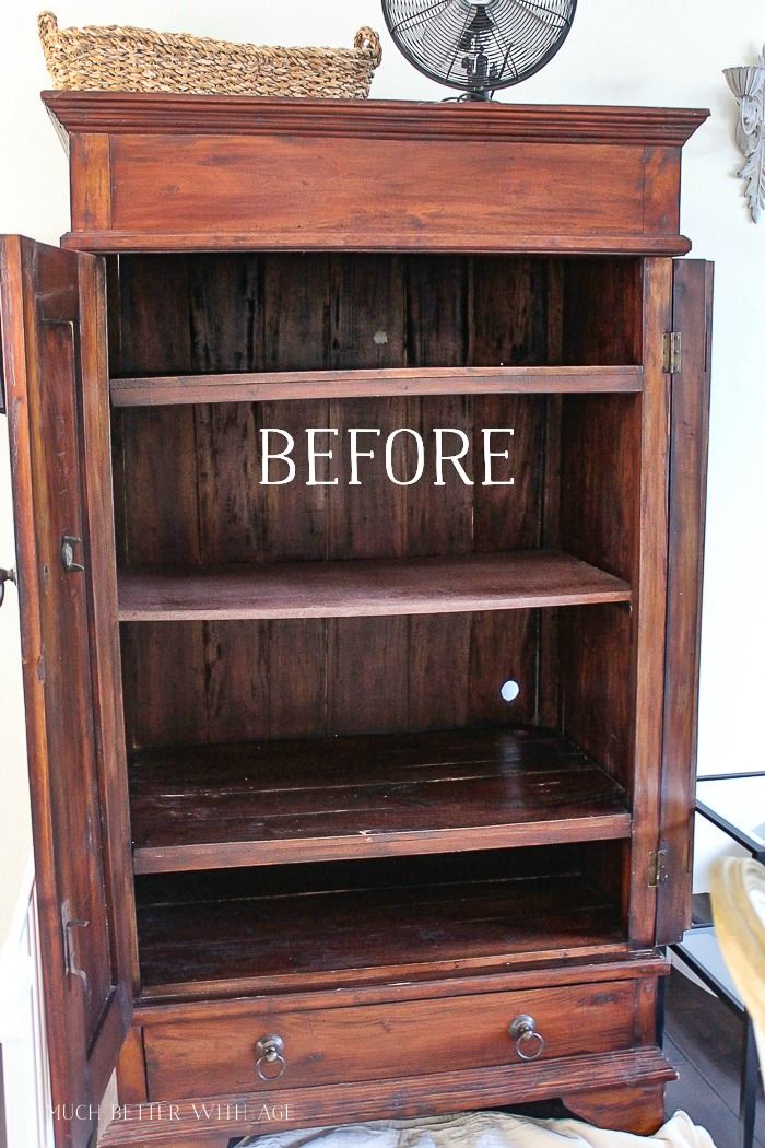 an old wooden bookcase with the word before painted on it's bottom shelf