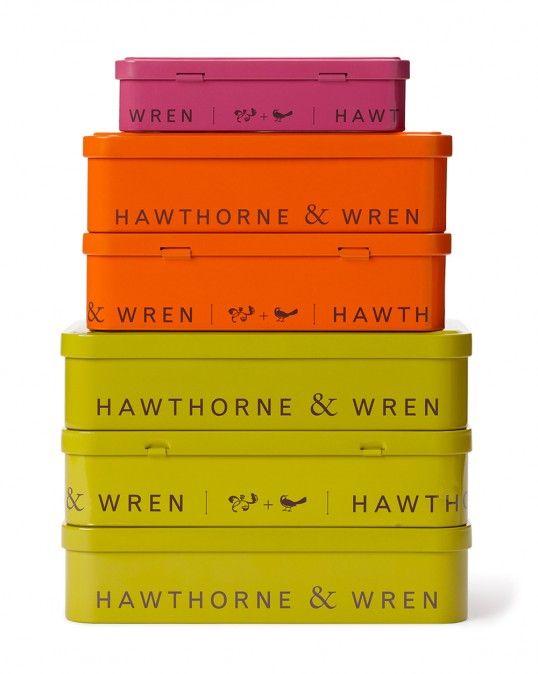 five boxes stacked on top of each other in different colors and sizes, with the words hawthornee & hawth printed on them