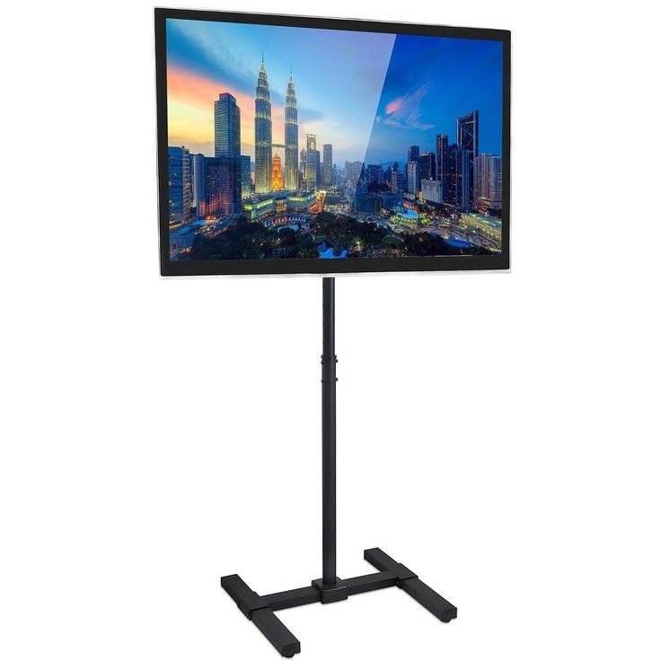 This TV stand features adjustable feet that allow easy leveling on uneven floors, commonly found in restaurants, trade shows, malls, and pubs. The mounting brackets fit VESA 200mm x 200mm and smaller, and is designed to hold screens 13" to 42" with a maximum weight of 44 lbs. The mounting bracket allows for 30 screen tilt upwards to maximize viewing angles. The total cart height reaches 52" with a base width of 20." Outdoor Television, Portable Tv Stand, Mobile Tv Stand, Tv Floor Stand, Swivel Tv Stand, Swivel Tv, Portable Tv, Photos Booth, Monitor Mount