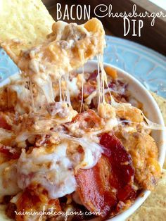 bacon cheeseburger dip in a bowl with tortilla chips