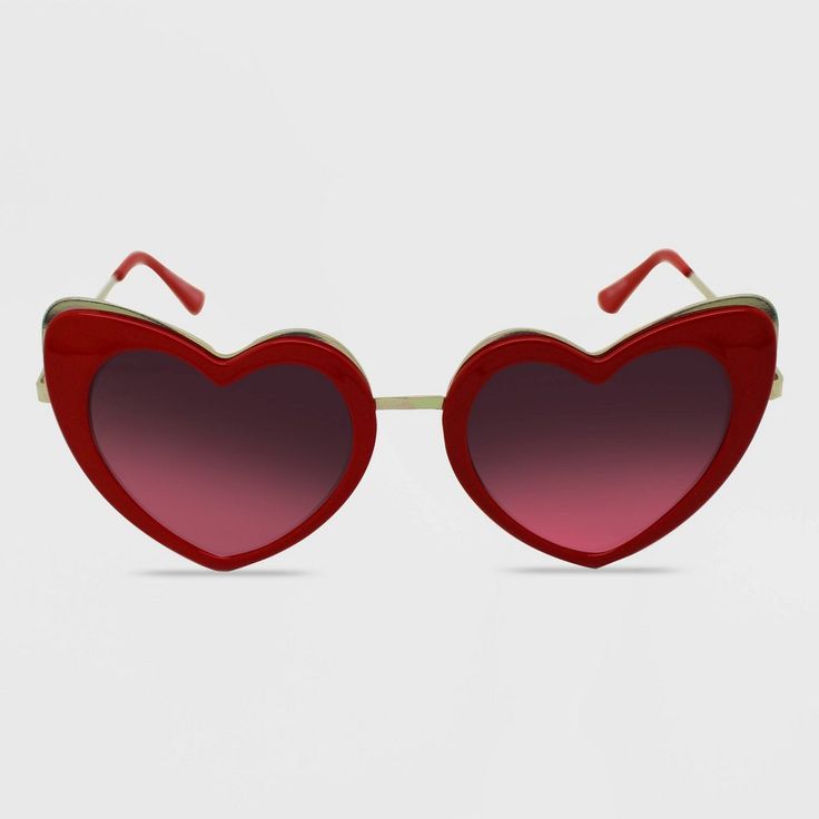 Heart sunglasses with red frame and pink lenses complement your casual and dressy outfits. UV protection helps keep your eyes protected from harmful sun rays, and hinged temples offer convenient folding and storage. If you’re not satisfied with any Target Owned Brand item, return it within one year with a receipt for an exchange or a refund. Gender: female. Age Group: adult. Red Mirrored Cat Eye Sunglasses For Summer, Fun Red Heart-shaped Sunglasses, Red Cat Eye Sunglasses With Polarized Lenses For Summer, Red Cat Eye Sunglasses With Tinted Lenses For Beach, Red Sunglasses For Spring Beach Occasions, Red Sunglasses For Beach In Spring, Fun Red Sunglasses With Gradient Lenses, Casual Red Cat Eye Sunglasses With Uv Protection, Red Cat Eye Sunglasses With Uv Protection