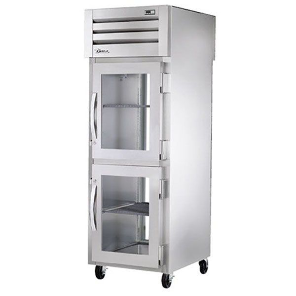 an empty stainless steel refrigerator on wheels