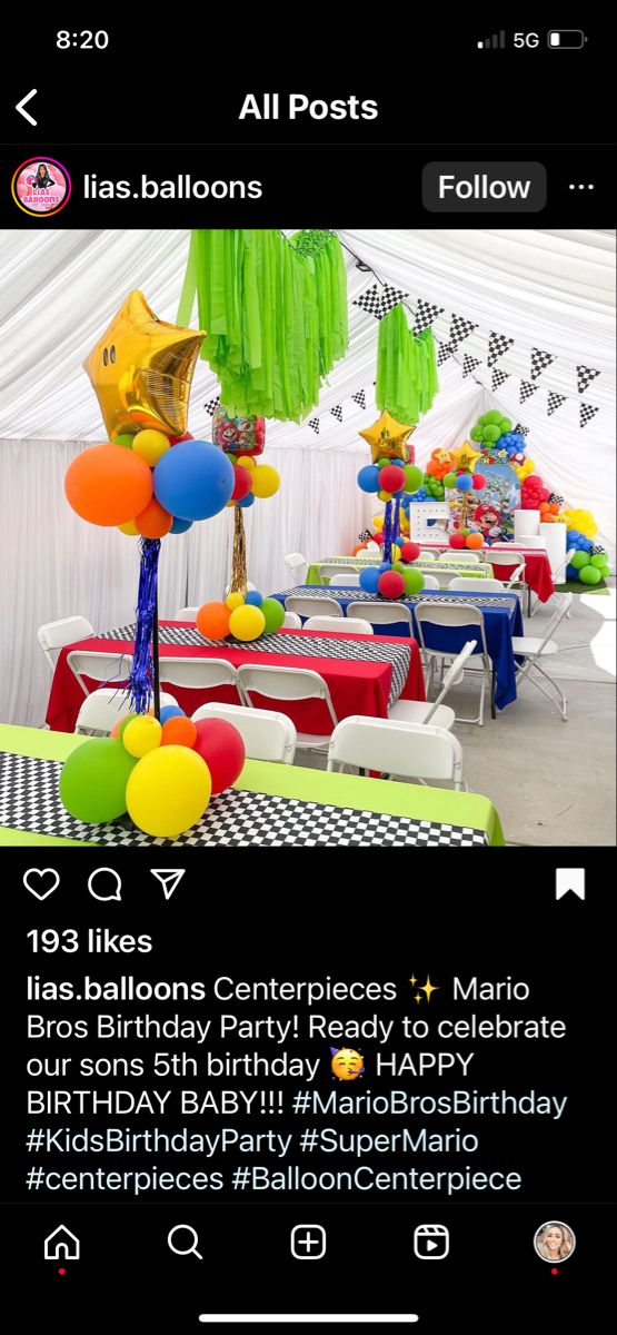 the birthday party is set up with balloons and streamers