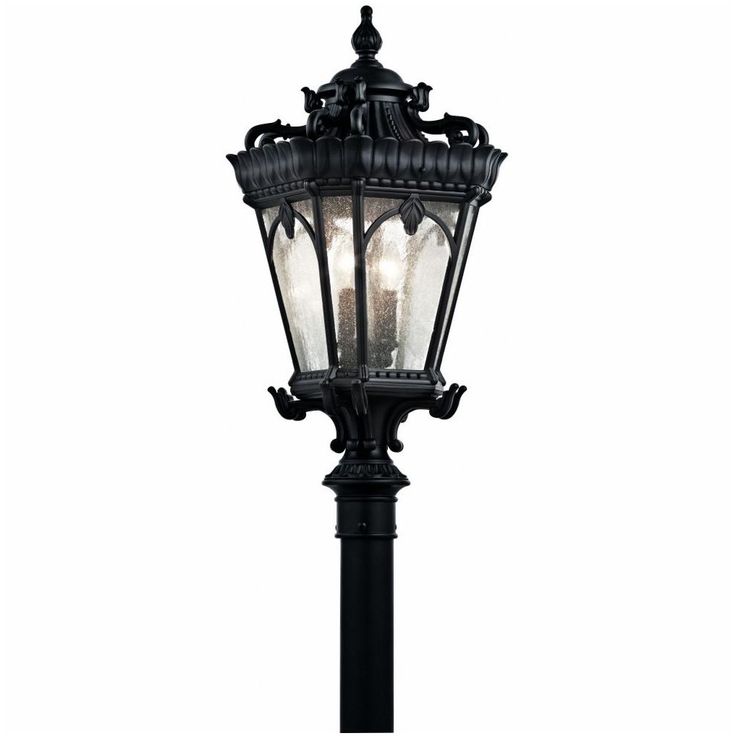 an old fashioned street light on a white background