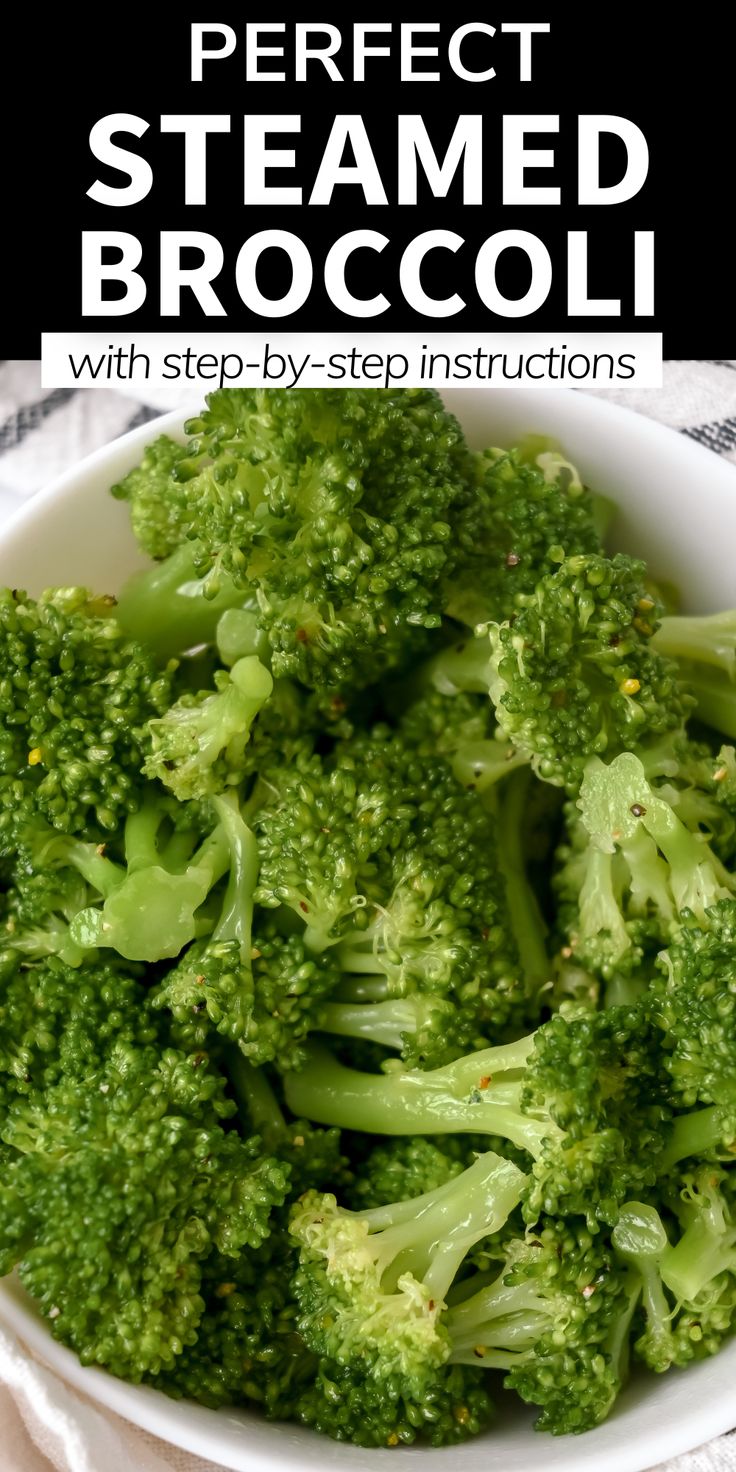 a white bowl filled with broccoli on top of a table