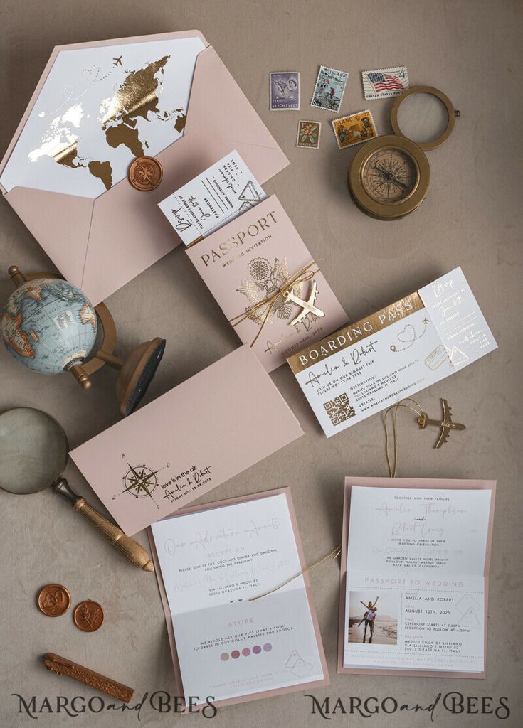 the wedding stationery is laid out on top of the table, including cards and envelopes