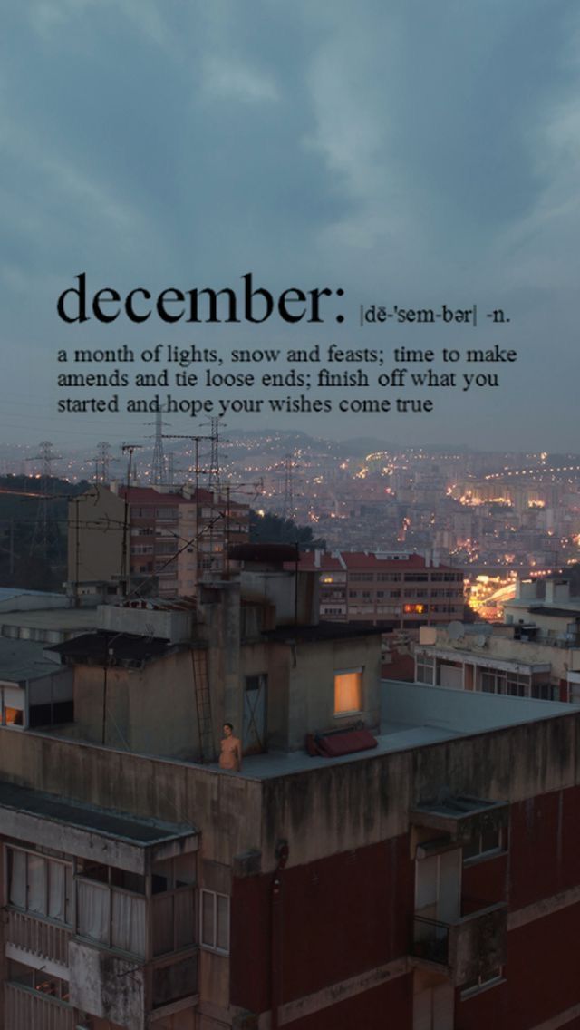 an advertisement with the words, december on top of a building in front of cityscape