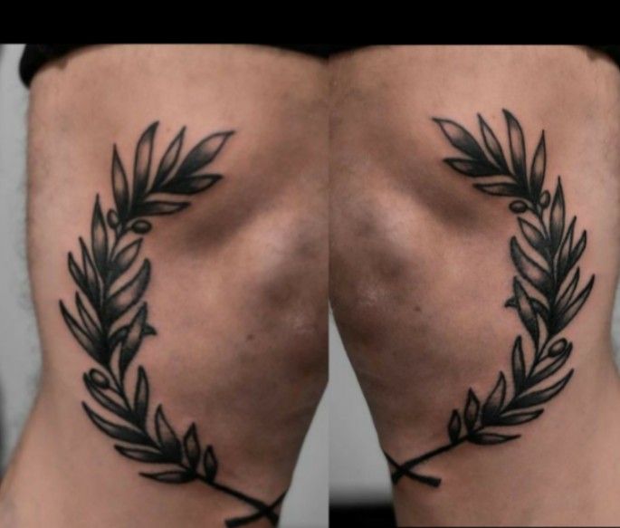 two pictures of the back of a woman's legs with tattoos on them and leaves