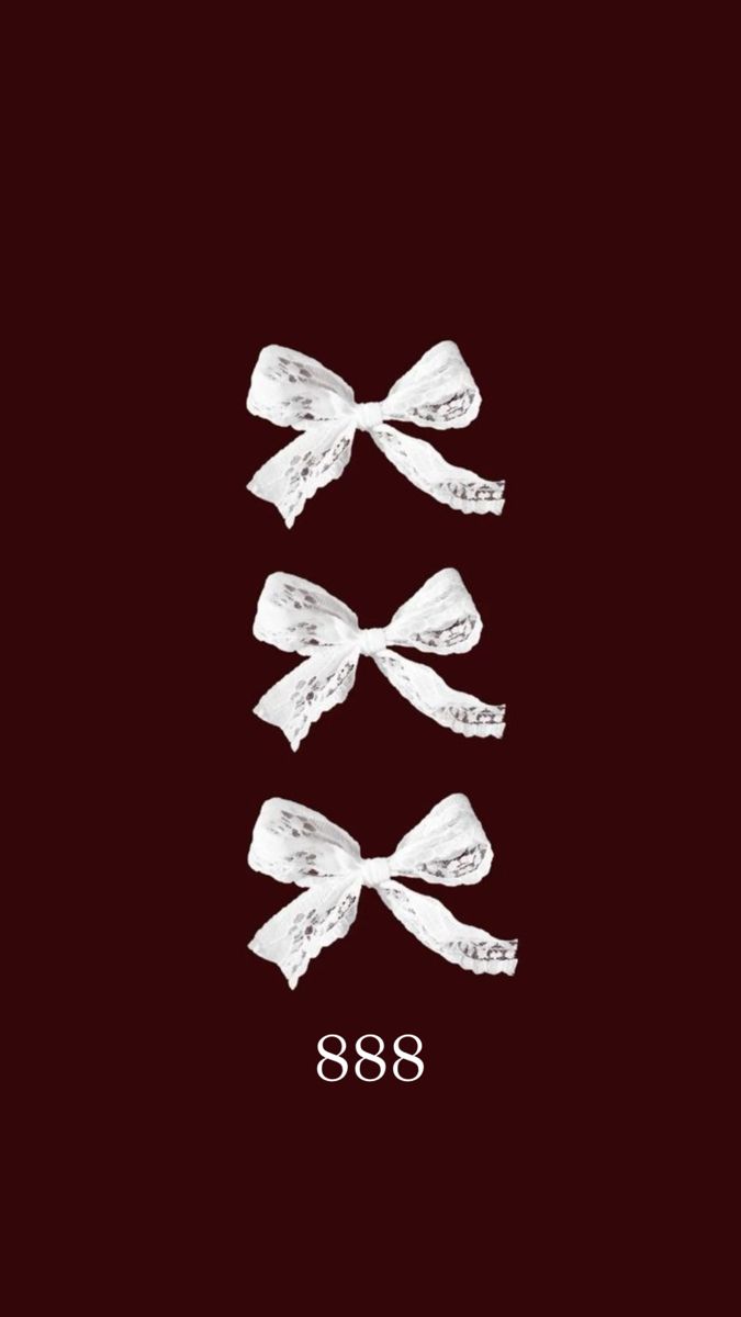 three white bows on a black background with the number 898 below them and an inscription underneath it