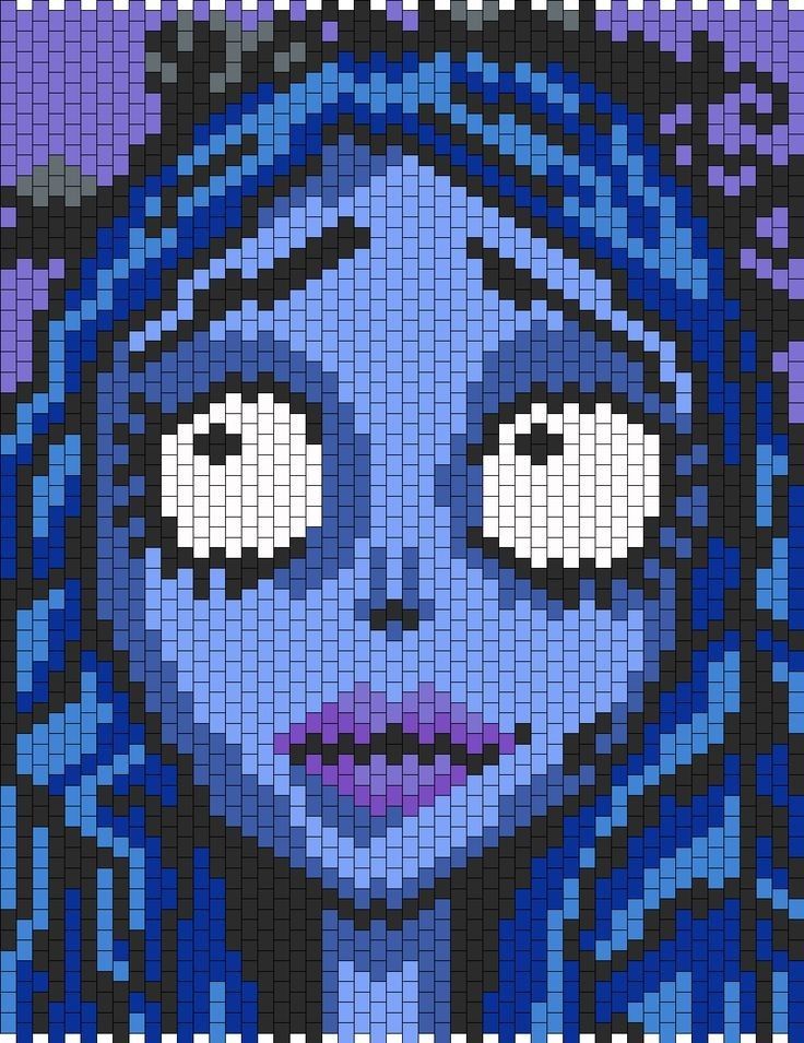 an image of a woman with blue hair and eyes made out of legos on the side of a wall