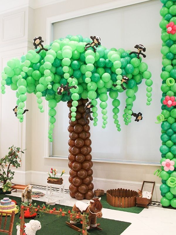 a balloon tree in the middle of a room