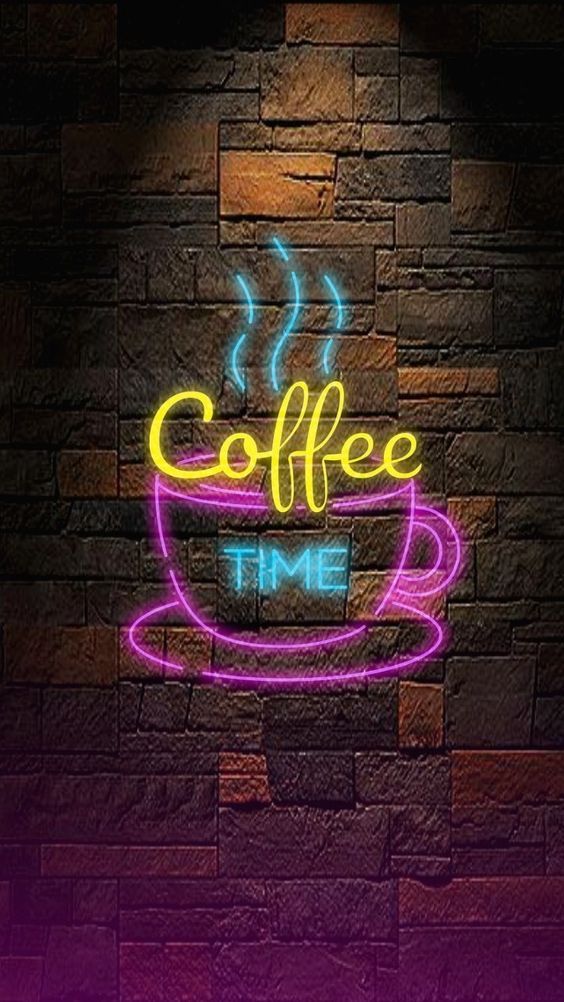 a neon sign that says coffee time on the side of a brick wall next to a cup of coffee