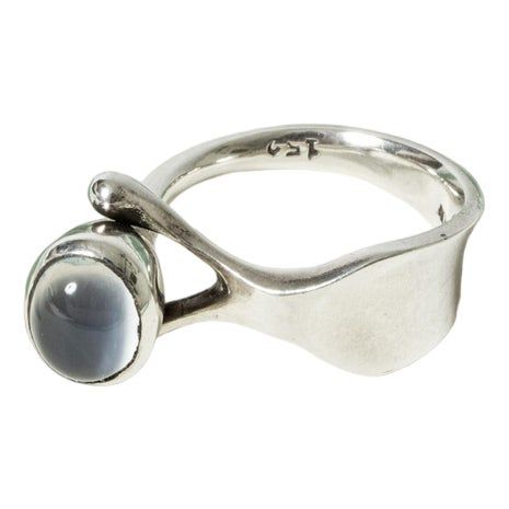 Amazing silver ring by Torun Bülow-Hübe, in a beautiful, organic form. A moonstone is set sprouting upwards from the band. Lovely glow in the stone. This piece has an attribution mark,   I am sure that it is completely authentic and  take full responsibility for any authenticity   issues arising from misattribution Art Deco Silver Ring, Vintage Silver Open Moonstone Ring, Adjustable Vintage Sterling Silver Moonstone Ring, Artisan Silver Adjustable Moonstone Ring, Silver Moonstone Cabochon Ring, Vintage Silver Hallmarked Moonstone Ring, Rings With Stone, Torun Bülow-hübe, Jewlery Rings