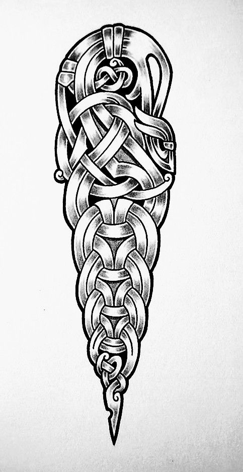 an intricate tattoo design in black and white