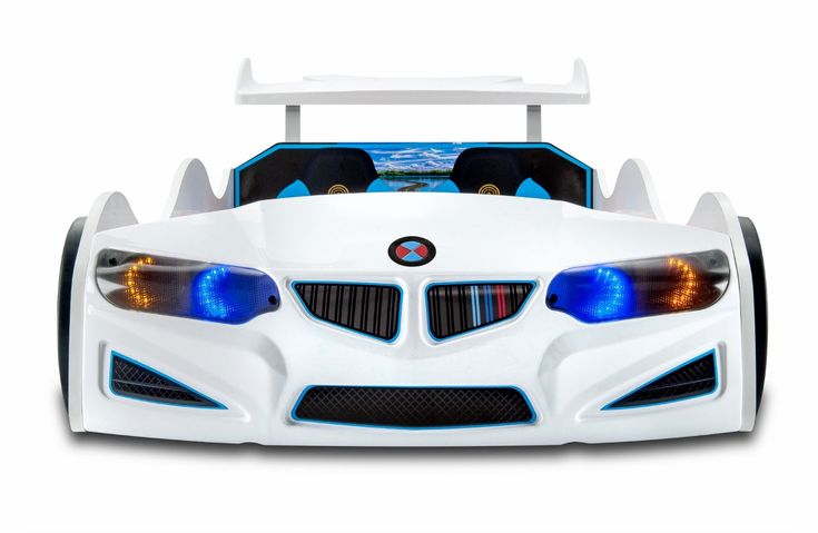 a white toy car with blue lights on it