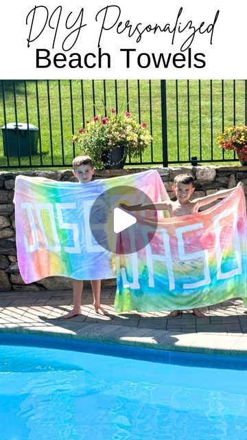 two children holding up a beach towel in front of a swimming pool with the words diy personalized beach towels