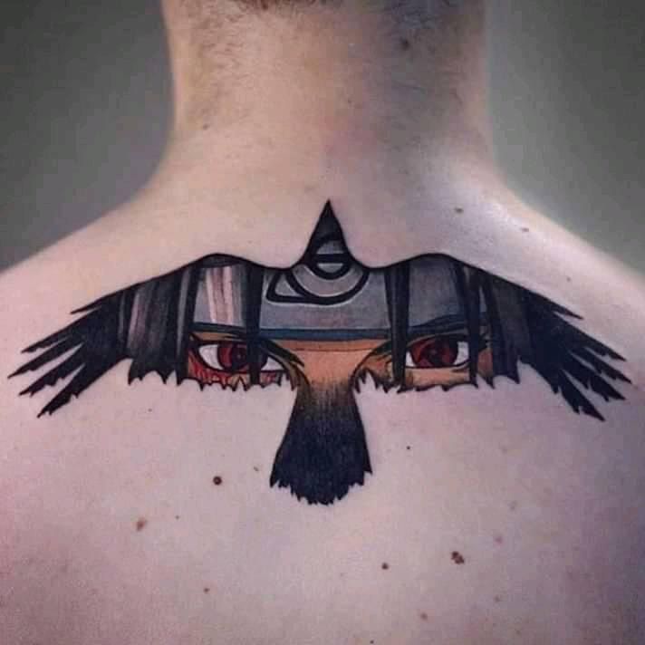 the back of a man's neck with an artistic tattoo design on his chest