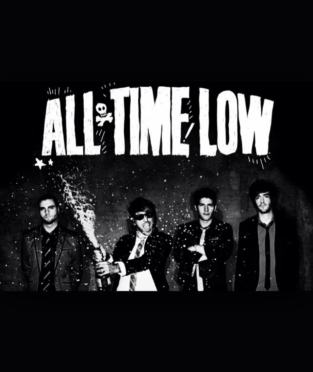 the band all time low posing in front of a black background with white writing on it