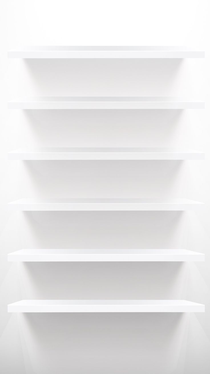 an empty white shelf in the corner of a room with light coming from behind it