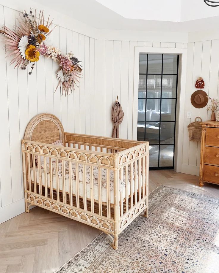 a baby crib in a room with white walls