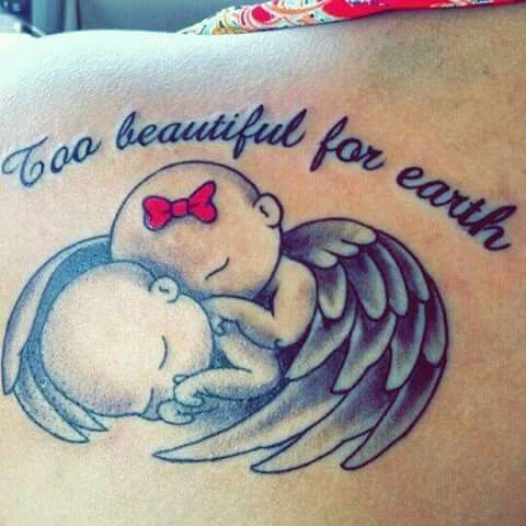 a woman's back with an angel tattoo on it that says, too beautiful for earth