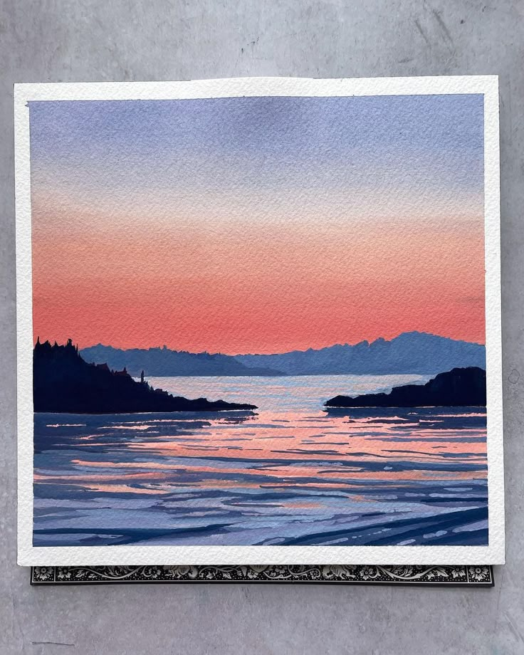 a watercolor painting of a sunset over the ocean with mountains in the back ground