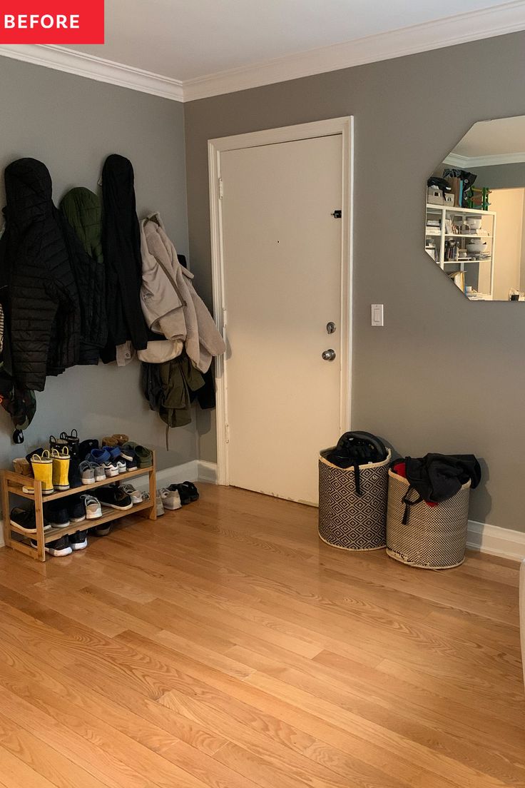 the entryway is clean and ready for someone to use it as a coat rack