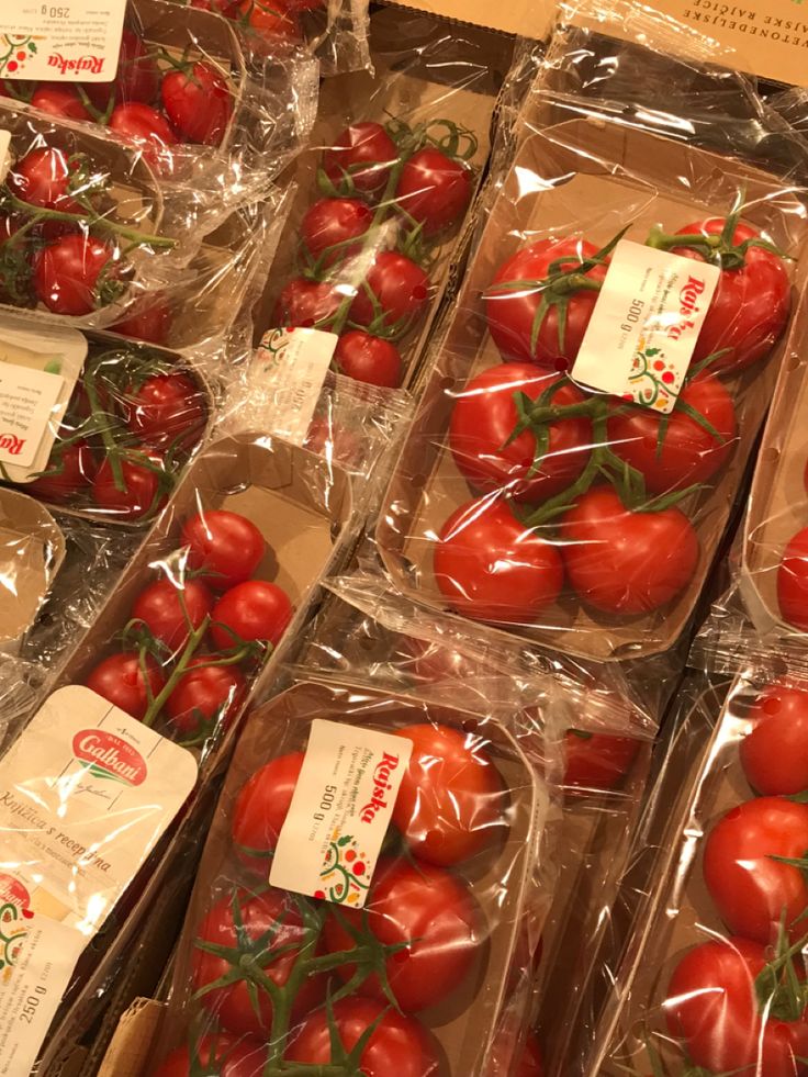 tomatoes are wrapped in plastic and ready to be sold at the store for $ 10