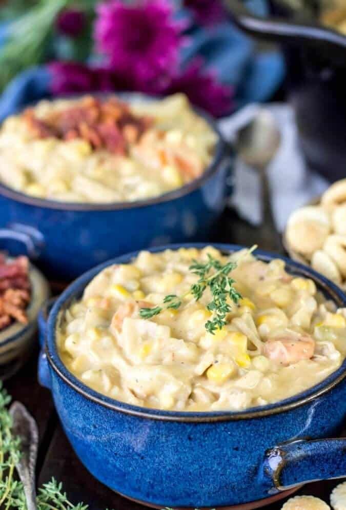 two blue bowls filled with macaroni and cheese