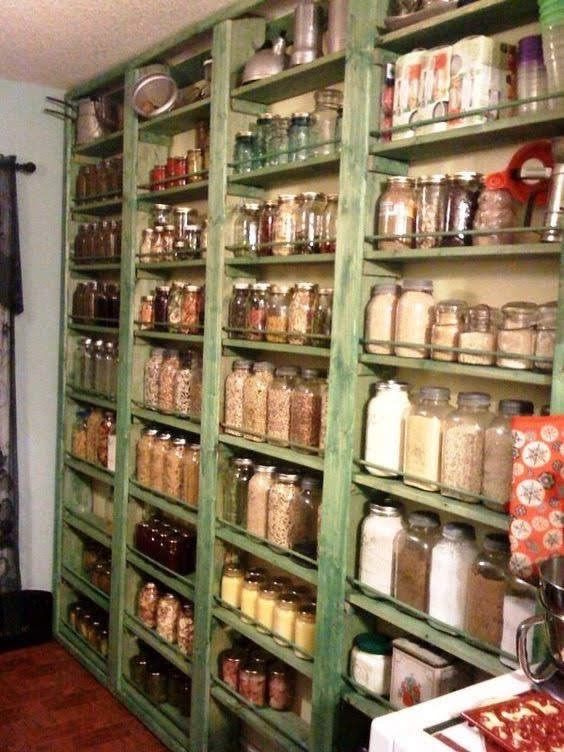 the shelves are filled with many different types of jars and containers, including one that is green