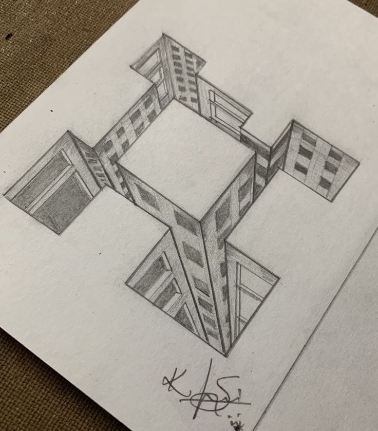 a pencil drawing of a building on paper