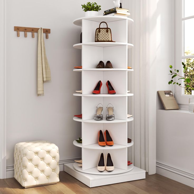 a white shelf with several pairs of shoes on it and a chair in the corner