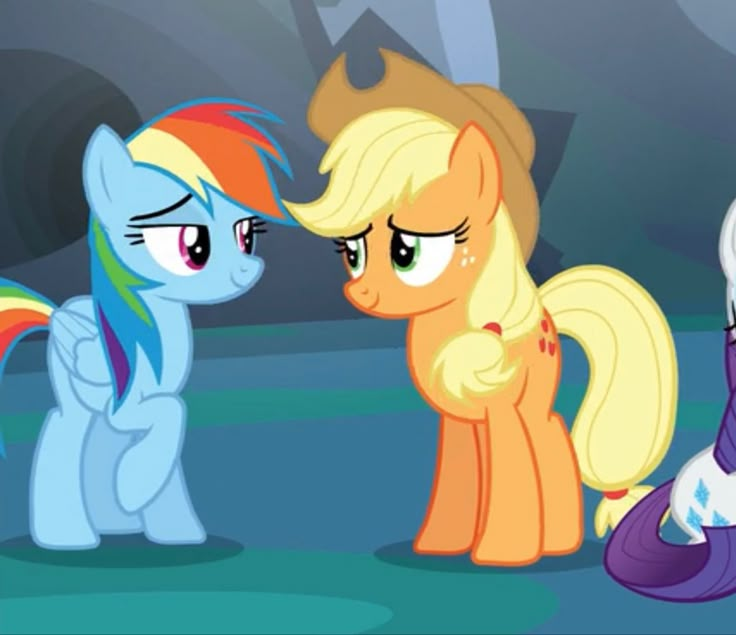 the three ponies are looking at each other