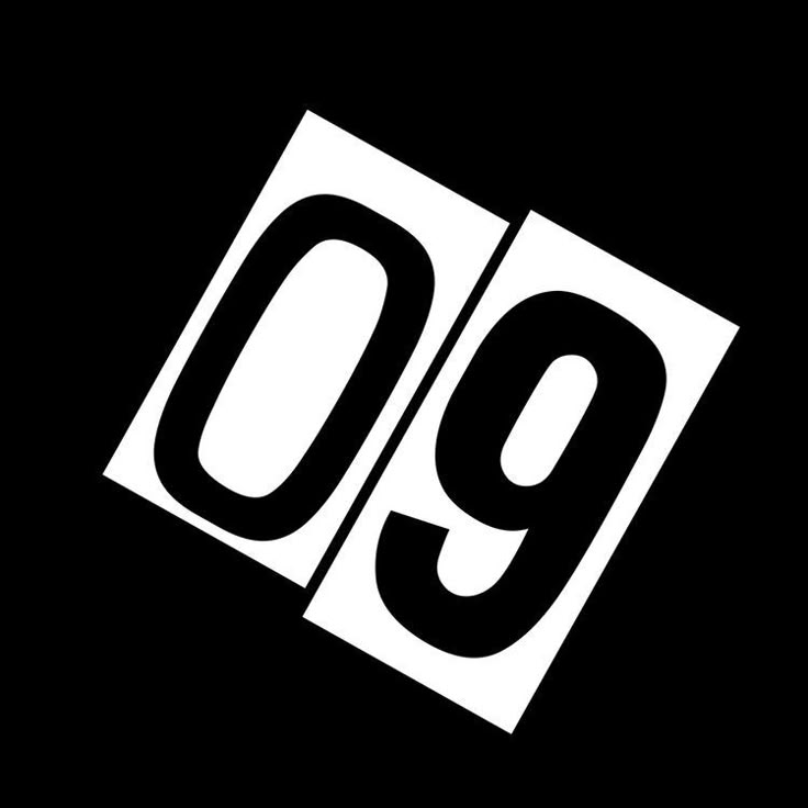 black and white logo with the number nine in it's center on a black background