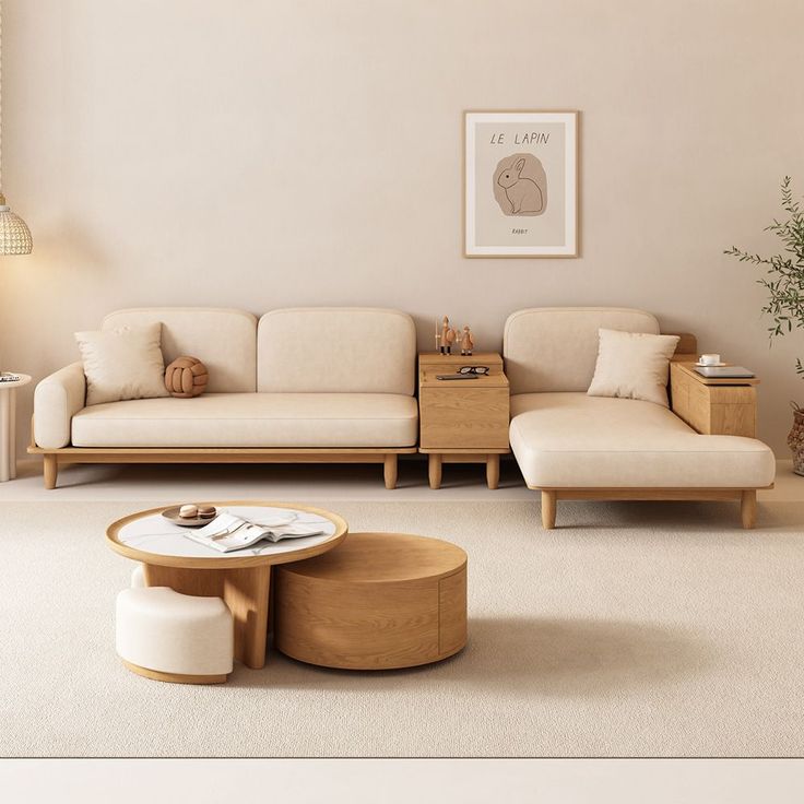 a living room with two couches and a coffee table in the middle of it