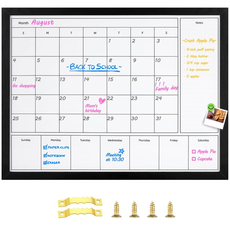 a dry erase calendar with magnets and clips