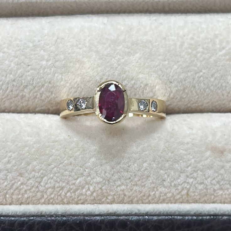 14kt Yellow Gold Ruby And Diamond Ring Size 6 1/2 4.2 Grams In Weight Gold And Garnet Jewelry, Pearl And Garnet Ring, 14k Yellow Gold Ruby Ring With Accent Stones, Classic 14k Stamped Ruby Birthstone Ring, Classic Ruby Diamond Ring Stamped 14k, 14k Gold Red Diamond Ring With Bezel Setting, 14k Gold Ruby Ring With Brilliant Cut Oval Shape, Timeless Yellow Gold Ruby Ring With Bezel Setting, Heirloom Ruby Ring With Accent Stones In Yellow Gold