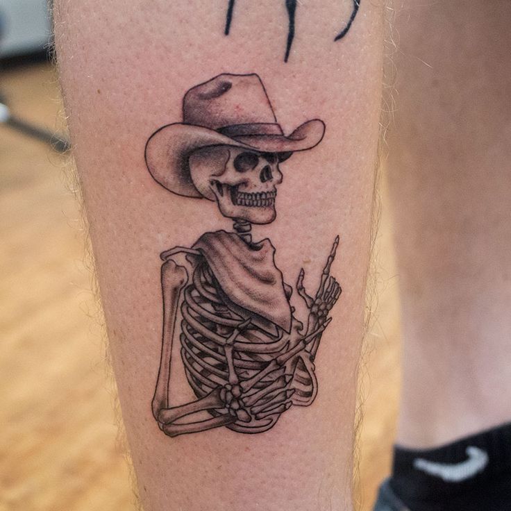 Rad cowboy skeleton shooting finger guns tattoo done by Jesse Myers #cowboytattoo #skeletontattoo #fingerguns #davenportia #quadcities #bnginksociety #bngtattoo #blackandgreytattoo #cheyennehawkpen #silverbackink #iowatattooshop #iowatattoo #davenportiowa #davenportia #quadcities Western Tattoos Ideas, Beer Tattoos, Cowboy Skeleton, Skeleton Cowboy, Cowgirl Tattoos, Cowboy Tattoos, Country Tattoos, Western Tattoos, Skeleton Tattoos