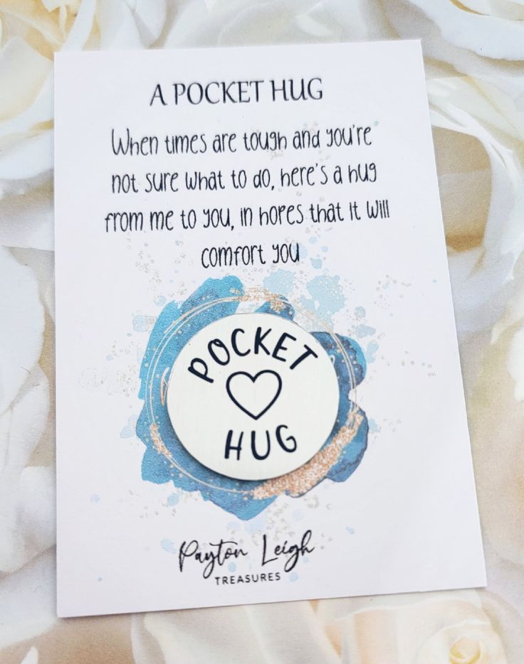 a pocket hug card with the words pocket hug written on it and a heart in the center